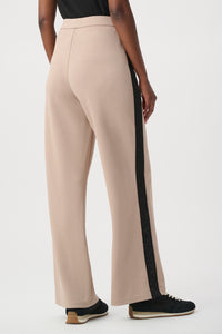 Beige trousers back view